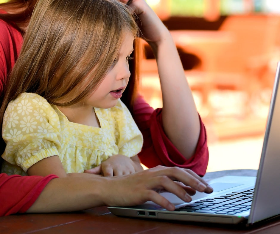 little girl on computer