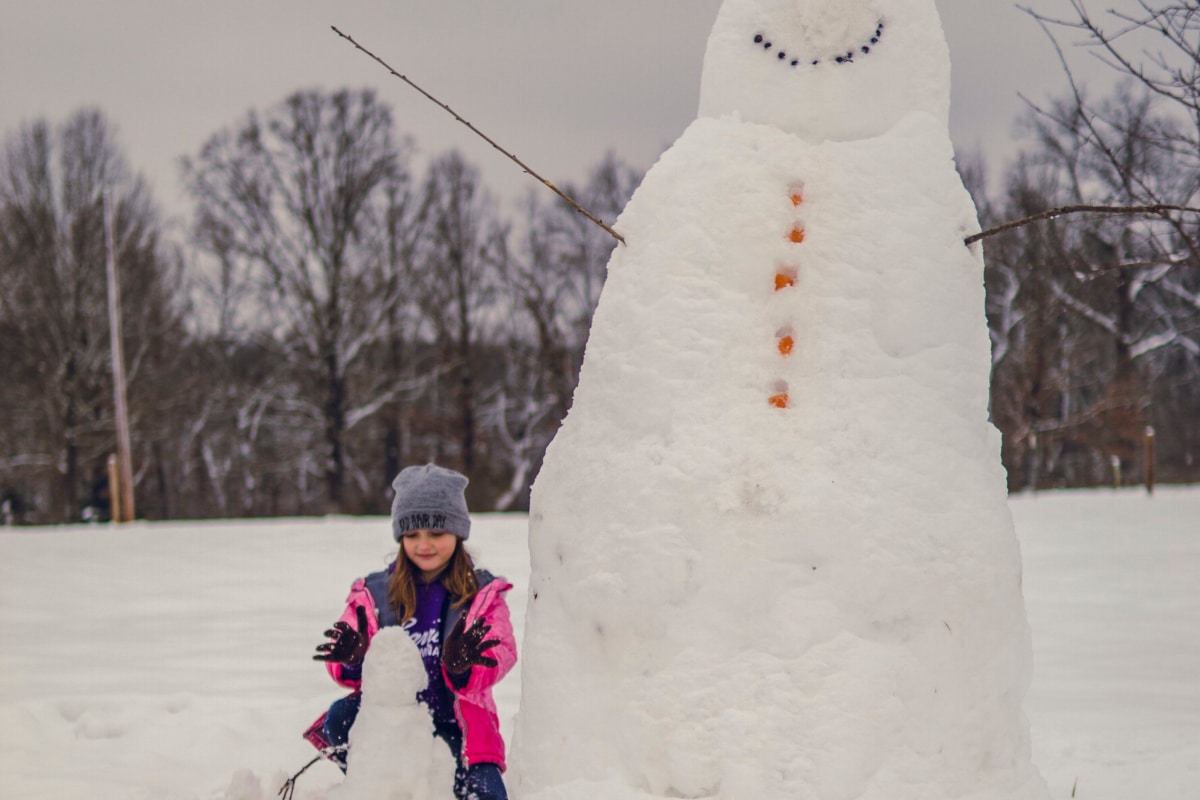 Girl with a Snow man