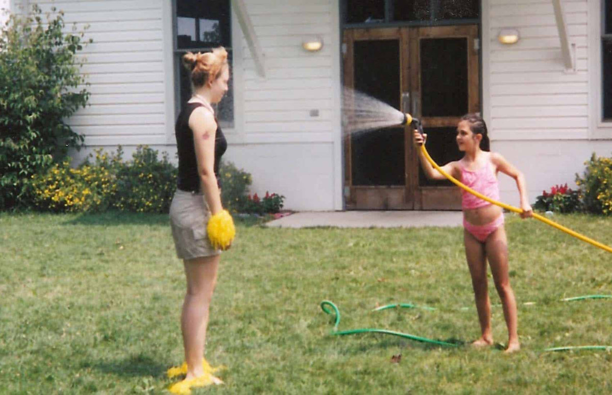 spraying a leader at summer camp