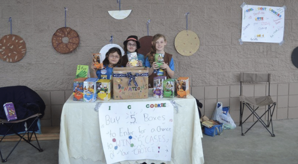 Girl Scout Cookie Booth Large cookies on wall